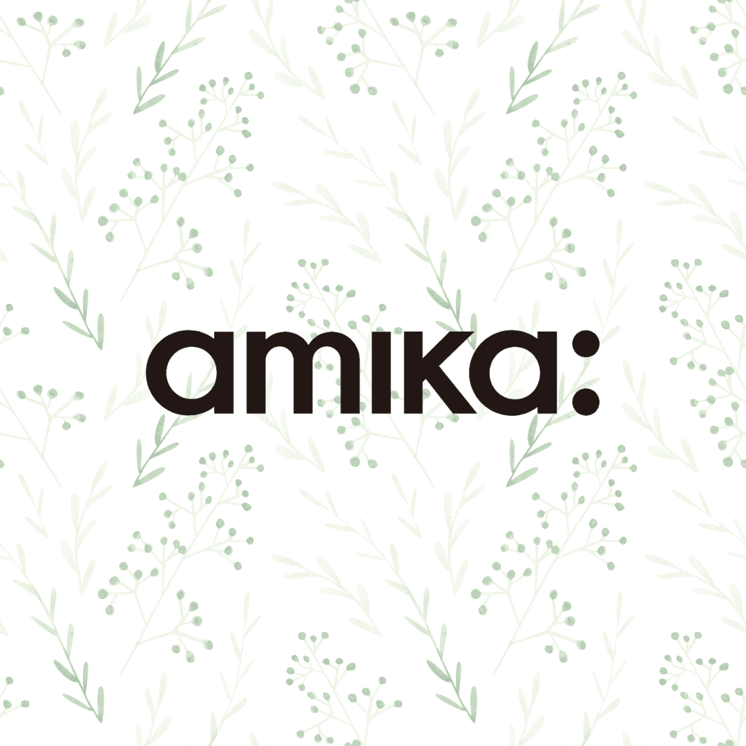 amika: logo on a floral, botanical background